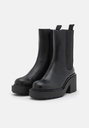 MONKI - Boots à plateforme - noir